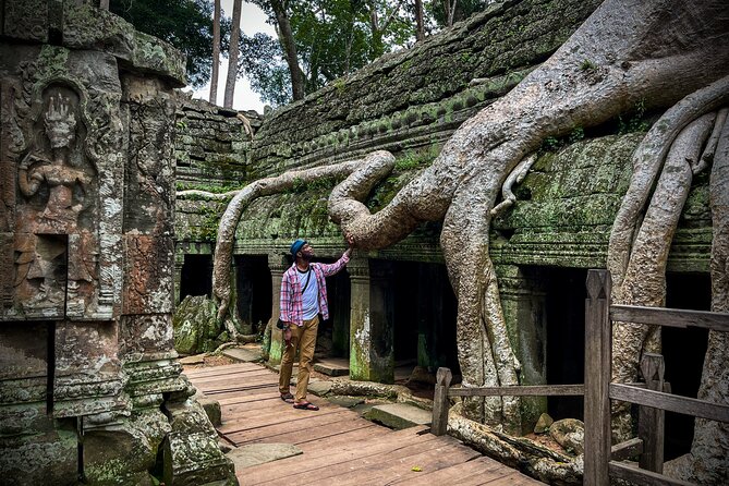 2 Day Angkor Wat Kulen Mountain Beng Mealea Floating Village Tour - Preah Ang Thom: a reclining Buddha carved into the mountainside