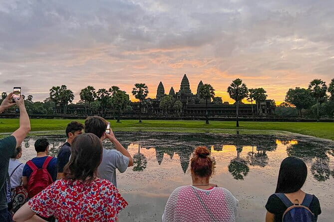 3 Day Angkor Wat Kulen Mountain Beng Mealea and Floating village - Day 1: Srah Srang, Ta Prohm roots, and Angkor Thom faces
