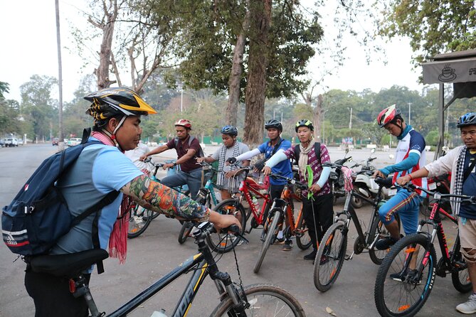Angkor Sunrise Expedition Cycling Through Serene Backroads - Ta Prohm on two wheels: roots, ruins, and village backroads