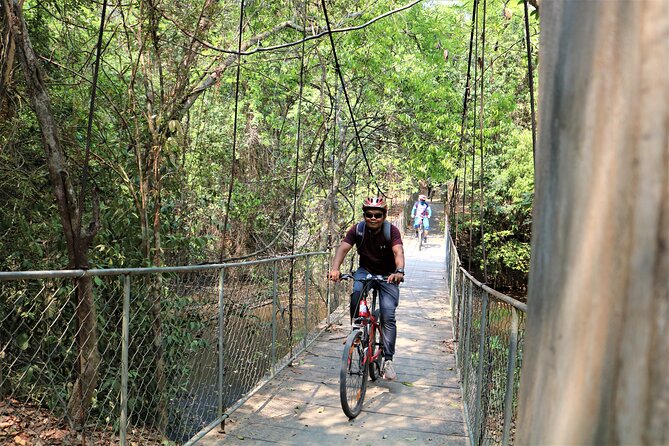 Angkor Sunrise Expedition Cycling Through Serene Backroads - Angkor Thom wall cycling: the feeling of a calmer circuit