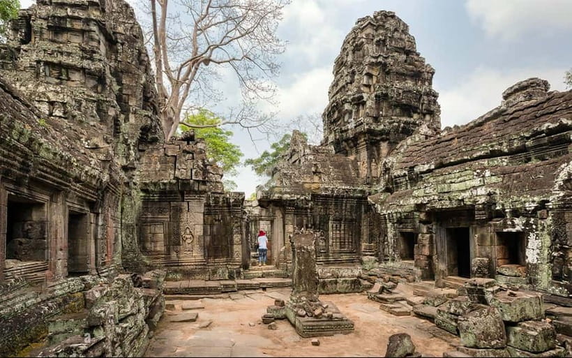 Angkor Wat: Full-Day Guided Sunset Tour - Bayon Temple: Hundreds of Stone Faces and the Buddhist Shift
