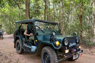 Angkor Wat Sunrise and Market Tour by Jeep - Breakfast-style stop at Srah Srang: noodles, palm cake, and a local host