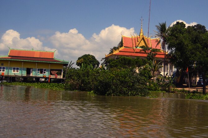 Angkor Wat Sunrise and Tonle Sap Cruise Sunset Tour - Tonle Sap sunset cruise: the calm ending to a long day