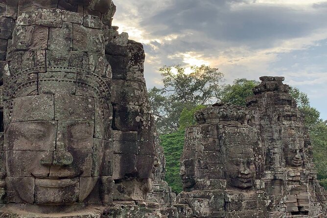 Angkor Wat Sunrise and Tonle Sap Cruise Sunset Tour - Angkor Thom highlights: South Gate, Bayon, and two must-see terraces