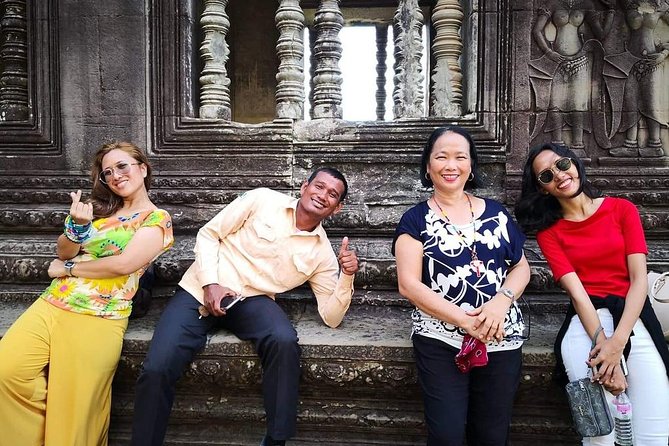 Angkor Wat Sunrise tour with Small - Group and Guide tours - Angkor Thom, South Gate, and Bayon: Faces and the Main Crossroads