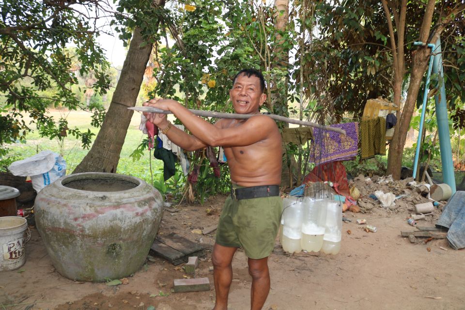 Angkor Wat: Tuk Tuk and Walking Tour - Ta Prohm jungle temple: trees through ruins and hidden forest tracks