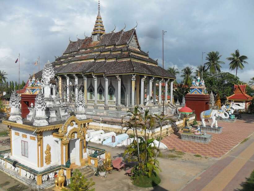From Siem Reap: Battambang Day Trip Bamboo Train, Bats Cave - Colonial buildings and local costumes: where Battambang’s past shows up
