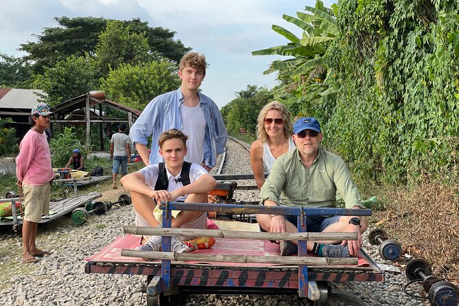 Full day tour by bicycle & tuk tuk,bamboo train,bat cave,villages - Where the Day Begins: Morning Views, Colonial Touches, and Snack Stops