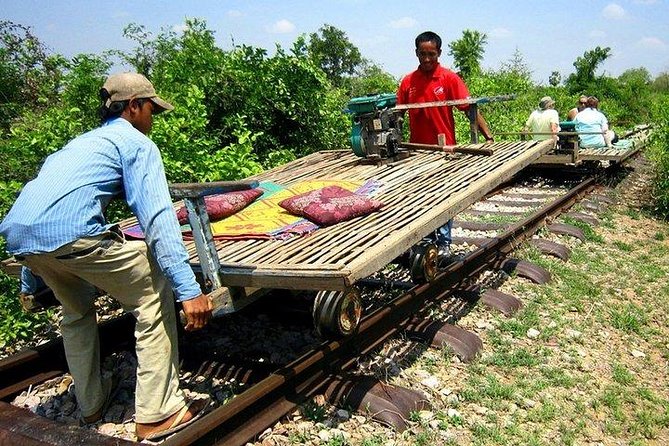 Full Day-Tour: Handicraft, Bamboo train, Killing cave. Bat cave - Stop 1: Rice Paper, Sticky Rice, Dried Banana, Rice Wine, and Fish Paste Work