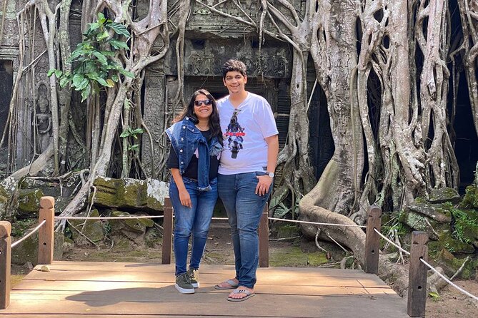 Half Day Angkor Wat Tour - Morning or Afternoon from Siem Reap - Ta Prohm: where the stones look like they’re fighting back