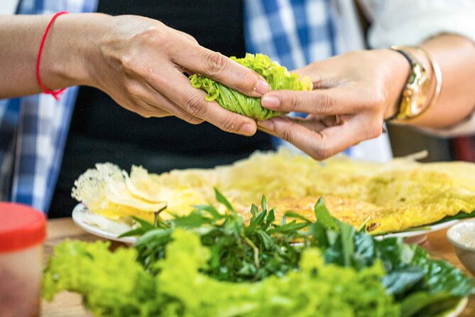 Phnom Penh Morning Market & Food Tour by Tuktuk - Includes All Food & Drinks! - Stop 3: the local wet market and a handmade souvenir