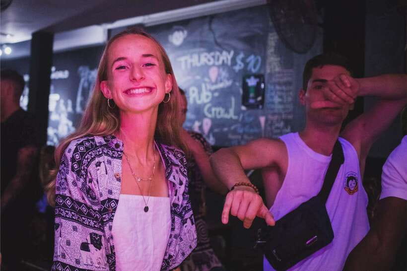 Phnom Penh Pub Crawl with Free Mad Monkey Singlet - Rooftop bar at 10:30 PM: city views, with a practical expectation