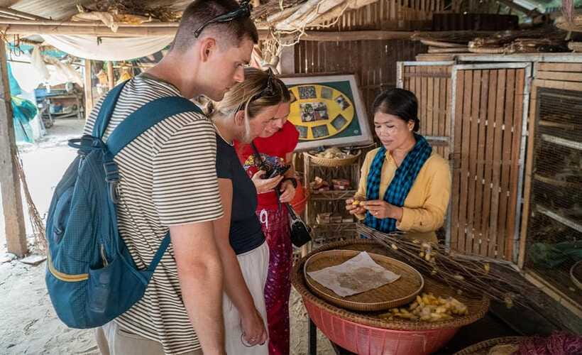 Phnom Penh: Silk Island Tour by Vespa with Tuk Tuk Available - Silk Island ferry terminal: the moment the day changes