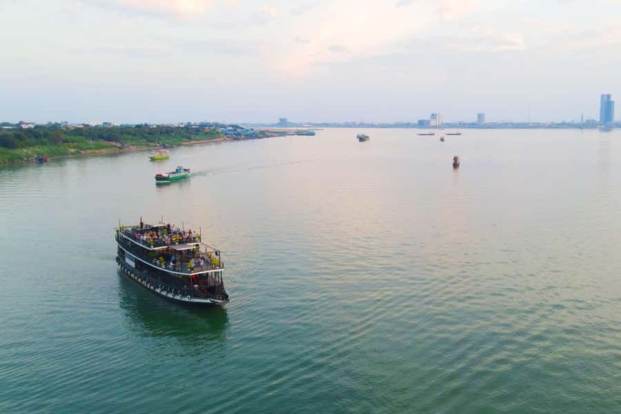 Phnom Penh: Sunset Dinner Cruise with English Speaking Guide - Silk Island: the local stop that turns a cruise into a story