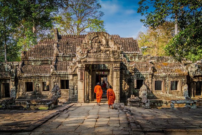 Private Temples Guided Tour (Angkor Wat, Ta Prom & Angkor Thom) - Ta Prohm: movie-famous, but the restoration details are the real takeaway