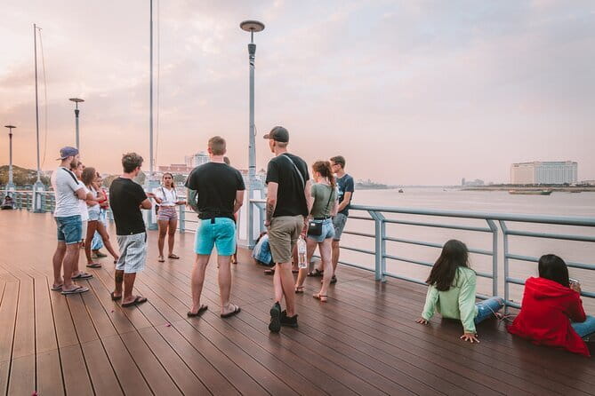 Riverside Walking Tour with Snack, Drinks & Local Ferry Ride - From Mad Monkey to the Start: Quick Tuk-Tuk, Then On Foot