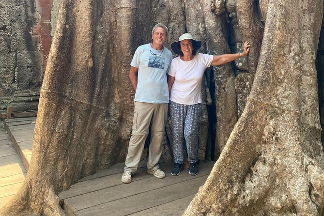 Siem Reap: 1 Day Angkor Wat + Sunrise Private Tour with Tuk-Tuk - Bayon at Angkor Thom: the faces, the symbolism, the timing