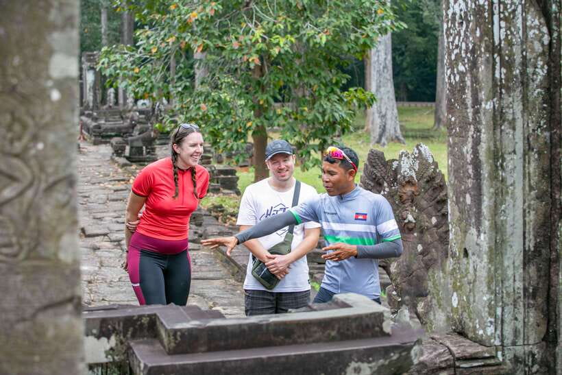 Siem Reap: Angkor Sunrise 2 Days Guided Bike Tour - Day 1 Temple Day: Angkor Wat Trails, Bayon, Preah Khan, and Ta Prohm