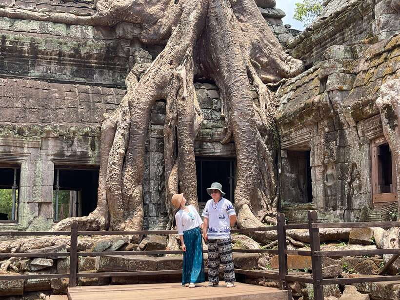 Siem Reap: Angkor Wat Private full Day Tour - Ta Prohm: Jungle-Enveloped Temple and the Mouhot Connection