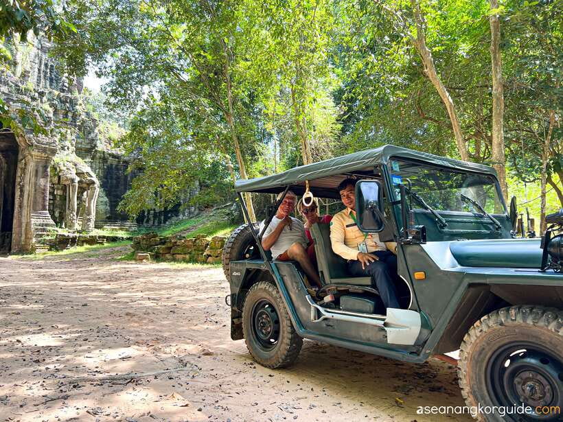 Siem Reap: Angkor Wat Sunrise and Market Tour by Jeep - Bayon Temple Faces and Victory Gate Photo Stops