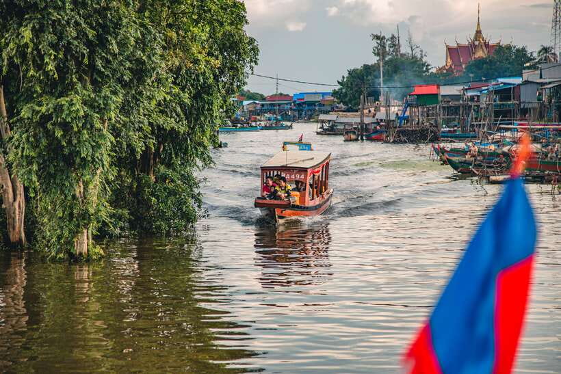Siem Reap: Floating Village and Sunset Private Boat Tour - Tonle Sap villages by boat: greeting waves and stilt-life