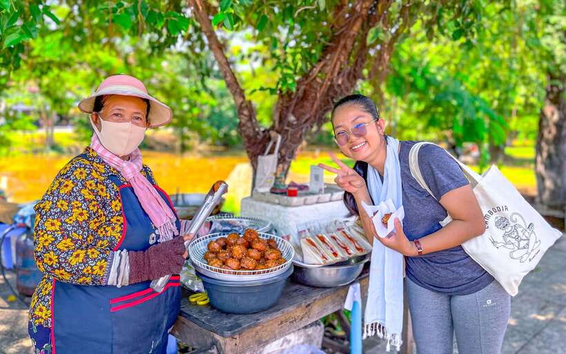 Siem Reap: FREE Market & Local Temple Tour - Getting explanations from Mr. Sivhong: how the guide changes the tour