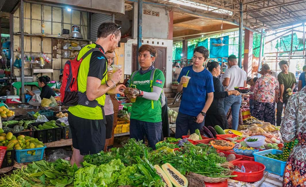 Siem Reap: Morning Food Tour, Market Walking & Street Art - Royal Independence Gardens street art stroll: digest food, spot creativity