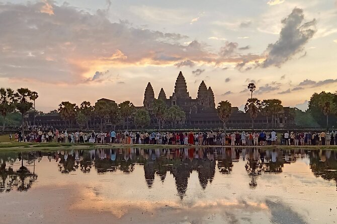 Siem Reap Private Day Tour: Angkor Wat Sunrise, Bayon & Ta Prohm - Ta Prohm: jungle overgrowth and the movie-ruin vibe