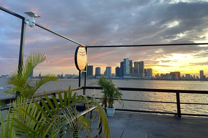 Sunset Cruise with free flow beer, soft drinks & fruit platter - Sailing past Phnom Penh landmarks from the water