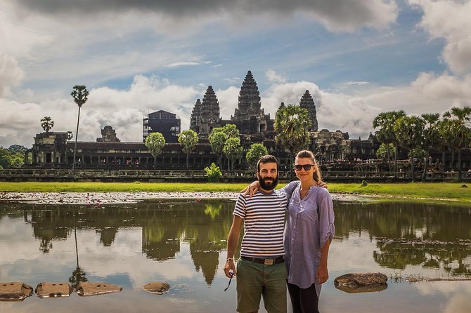 Sunset or sunrise bicycle tour around Angkor Wat and nearby temples - Ta Prohm: the jungle-catching-ruins stop