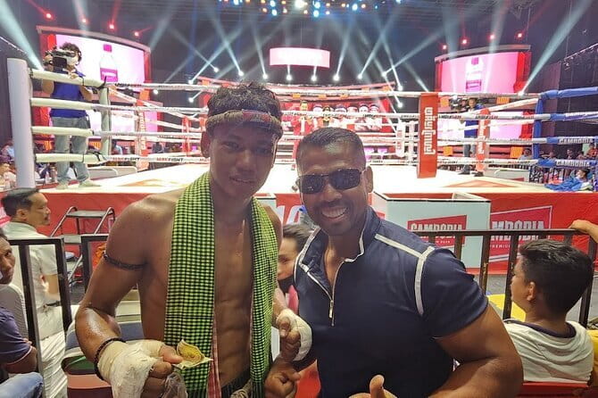 Watch Live Khmer Traditional boxing in Phnom Penh - Drinks, photos with fighters, and stepping into the ring after the show